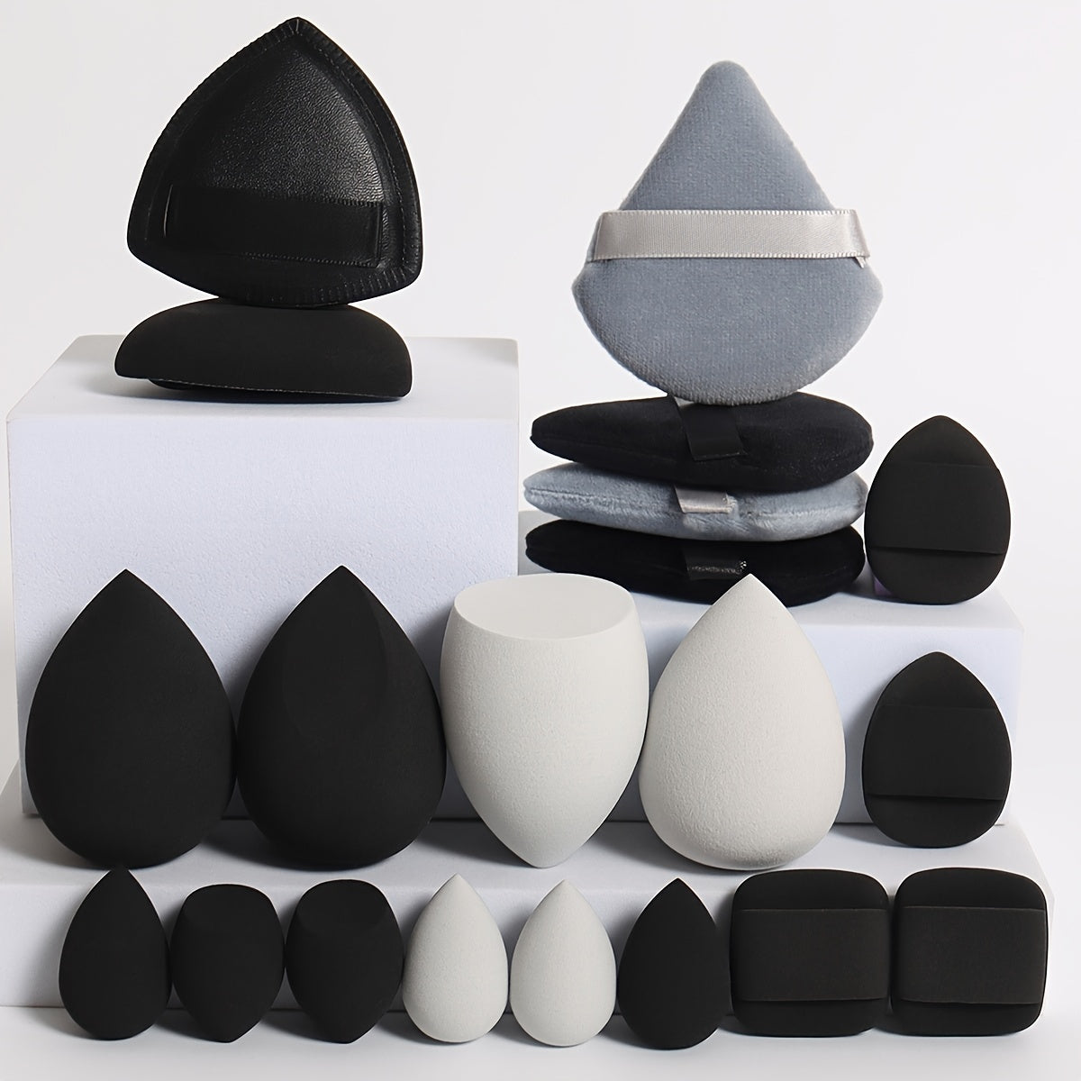 A 20pcs Candy Set, Including 2 Cushion Puffs, 4 Loose Powder Puffs, 4 Makeup Sponges, 6 Mini Makeup Sponges, And 4 Mini Cushion Puffs. These Beauty Sponges Are Perfect for Blending BB Cream, Foundation, And Concealer, Especia