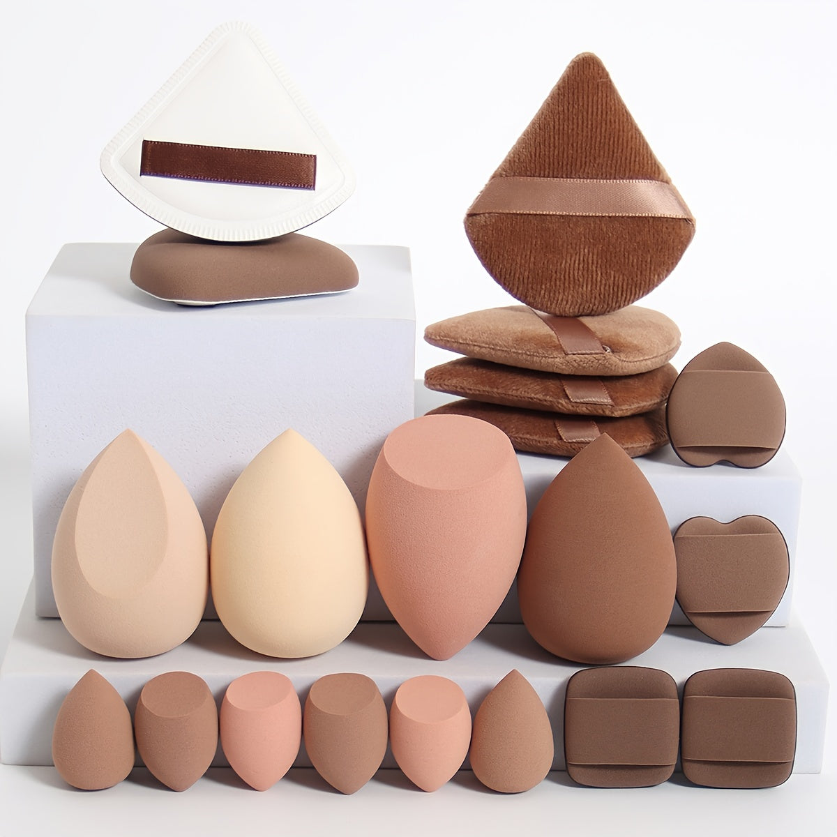 A 20pcs Candy Set, Including 2 Cushion Puffs, 4 Loose Powder Puffs, 4 Makeup Sponges, 6 Mini Makeup Sponges, And 4 Mini Cushion Puffs. These Beauty Sponges Are Perfect for Blending BB Cream, Foundation, And Concealer, Especia